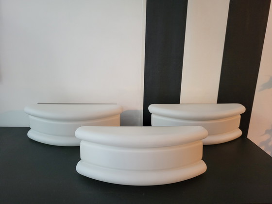 Image 1 of 3 RAAK (bathroom) wall lamps with opaline glass shade and stainless steel frame.