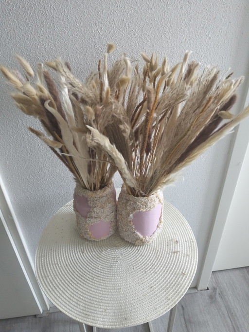 Vases star and heart with artificial flowers