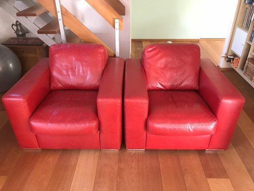 2 fauteuils robustes en cuir rouge