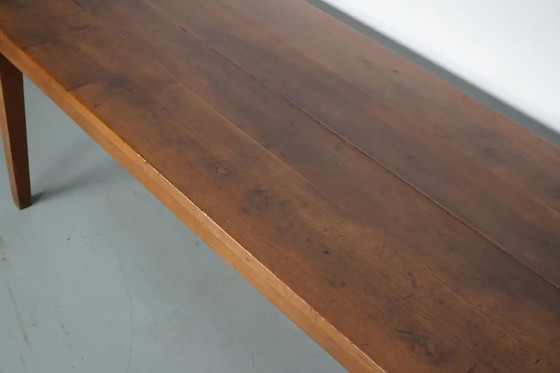 Image 1 of Antiker französischer rustikaler Bauernhaus-Esstisch aus Kirschholz aus dem frühen 20. Jahrhundert