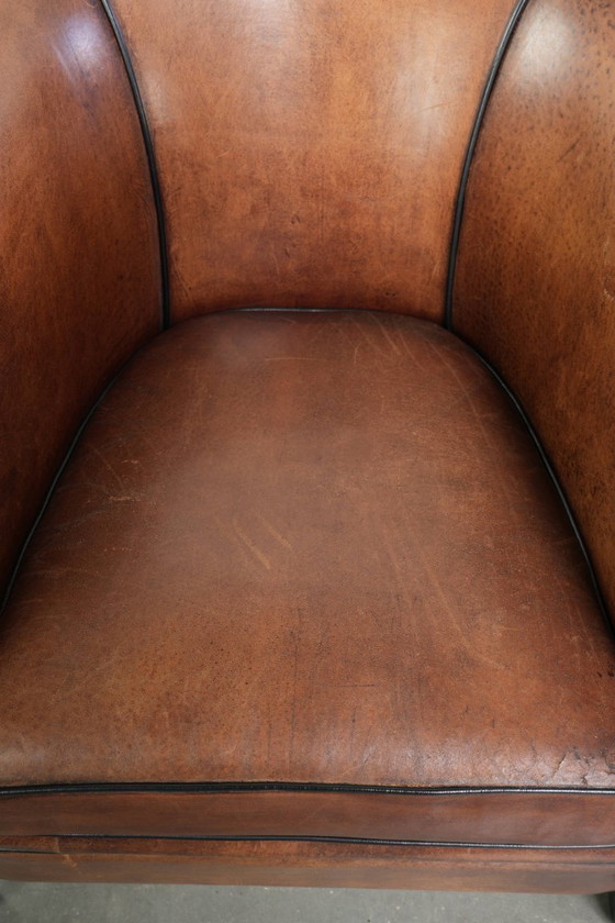Image 1 of 2x schapenleren Art Deco design clubfauteuil met een mooi patina, zwarte biezen en mooie kleuren