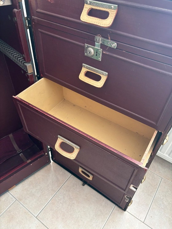 Image 1 of Oshkosh stoombootkoffer uit 1920