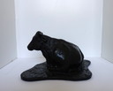Cow in bronze.