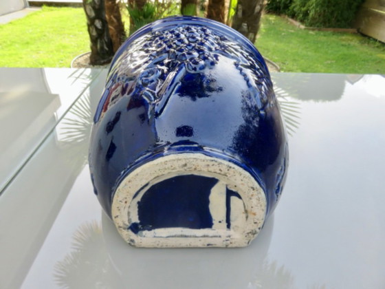 Image 1 of Wall-mounted flower pot, grape motif, in blue glazed ceramic, 1970s