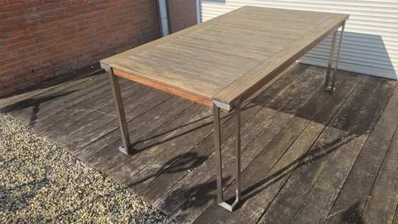 Image 1 of Set da giardino con tavolo in teak e 4 sedie in acciaio inox, realizzato in teak e textilene.