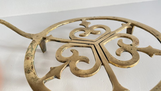 Image 1 of Solid brass trivet