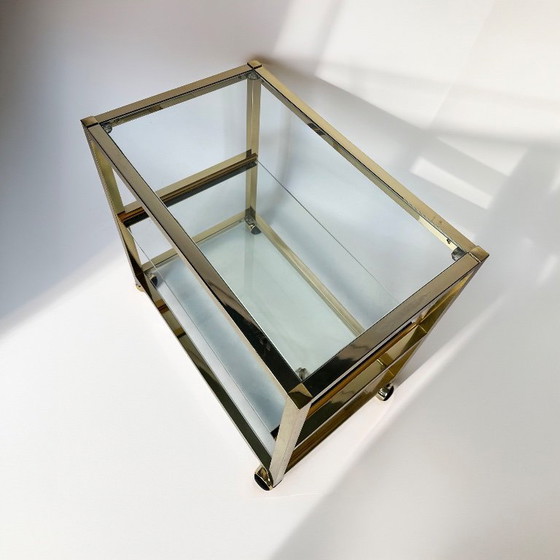 Image 1 of Vintage bijzettafel uit de jaren 80 met gouden chromen afwerking.