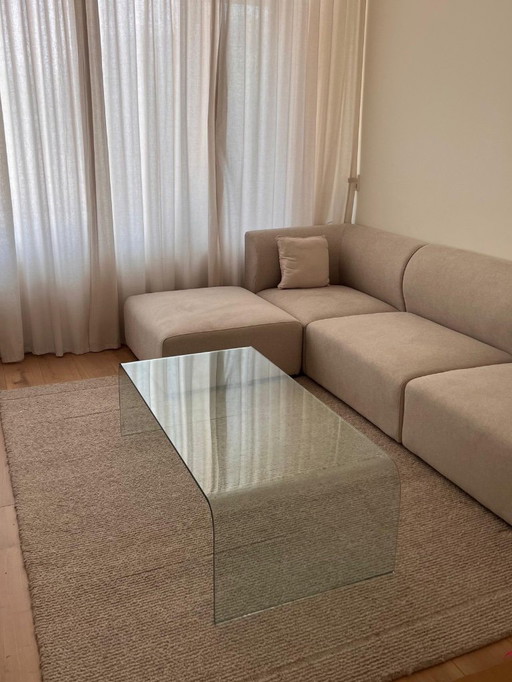 Glass curved coffee table