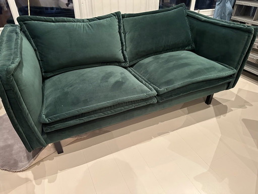 Berry sofa in pure emerald green