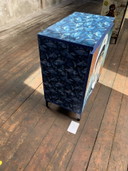Vintage cabinet upcycled with art prints by Sailor