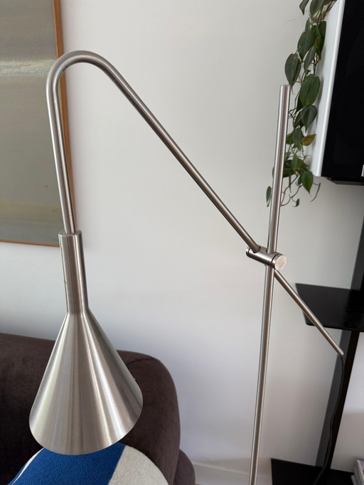 Sleek stainless steel floor lamp