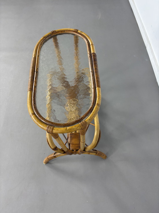 Image 1 of Vintage rotan bijzettafel wolkenglas met lectuurbak jaren’60
