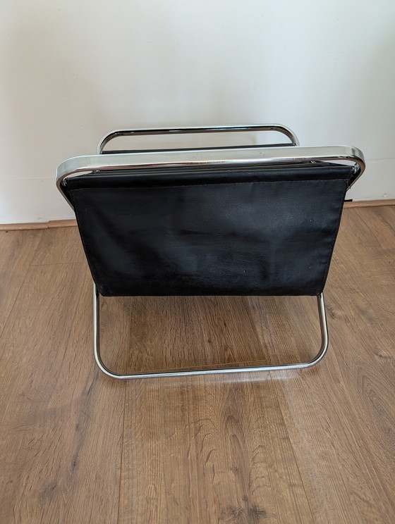 Image 1 of Castelli kranten houder jaren 60