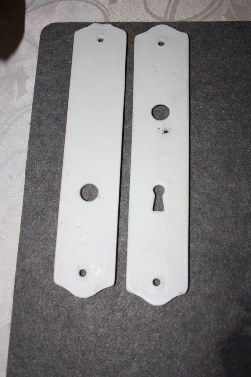             Antique porcelain door fittings with floral pattern - 25 cm long