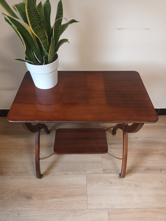 Image 1 of Vintage side table on wheels