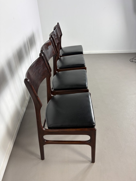 Image 1 of Set off 4 Vintage Palissander Wood With Black skai Leather dining chairs