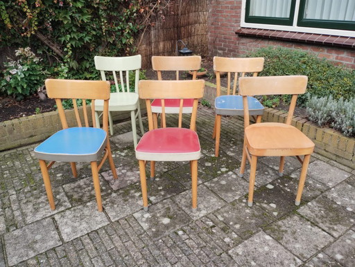 Set aus sechs Vintage Kok (60er Jahre) Esszimmerstühle in verschiedenen Farben