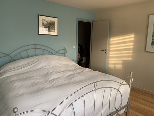 Cast iron art deco bed frame and two bedside tables
