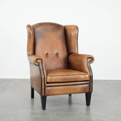 Sheepskin wing chair with a characterful appearance
