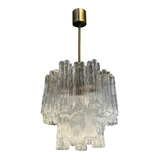Lampadario di lusso Tronchi con struttura in metallo brunito e vetro di Murano.