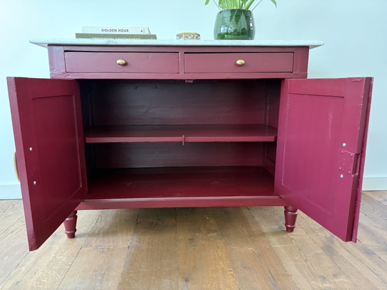 Image 1 of Bordeaux red sideboard with marble top