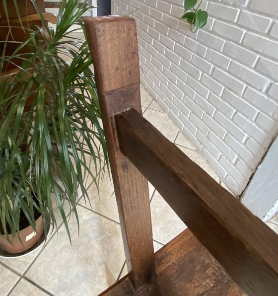 Image 1 of Twee massief eikenhouten boerenbanken van 214 cm voor een rustieke boerentafel uit de jaren 50.