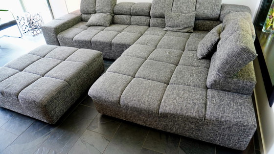 Image 1 of Moderne Grijze Hoekbank met Hocker - Comfortabel en Stijlvol