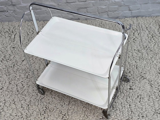 Image 1 of Vintage Foldable and Mobile Chrome Steel ‘Dinett’ Serving Trolley with 2 White Layers by Gerlinol, Germany, 1970s. 