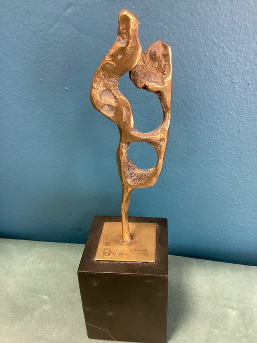 Scultura originale in ottone e marmo di David Marshall, edizione limitata 5/80, firmata.