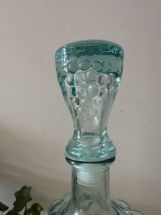 Image 1 of Caraffa Empoli con grappolo d'uva e tappo originale.