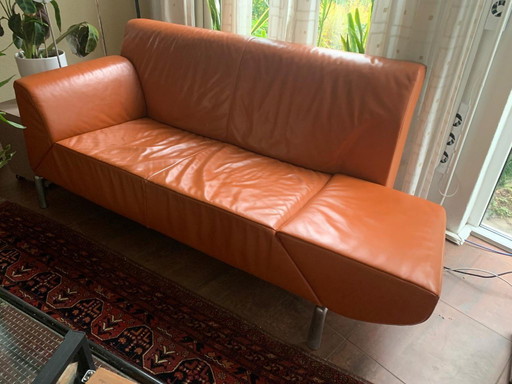 Jori two-three-seater design sofa with adjustable backrest in orange leather