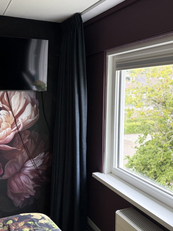 Image 1 of Floor-to-ceiling dark blue curtains