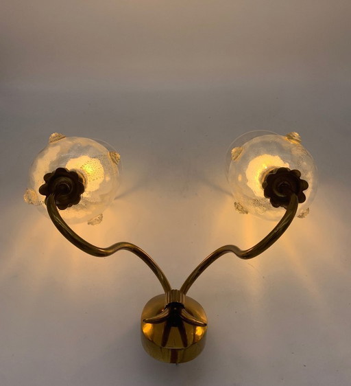 Par de lámparas de pared atribuidas a Seguso de los años 60, Murano con dorado.