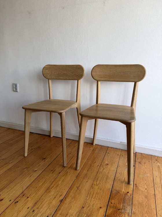 Image 1 of Round oak table with solid oak chairs