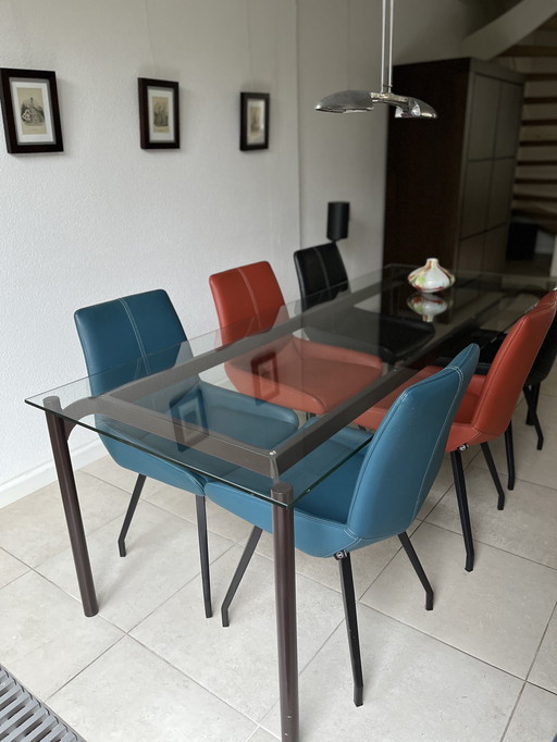 Mesa de comedor de cristal de diseño único con base de acero 218x87 cm