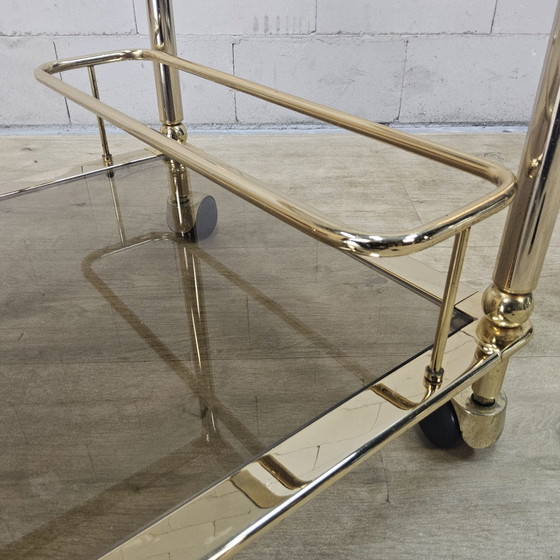 Vintage golden brass bar cart / trolley smoked glass shelves (photo 6 of 15)