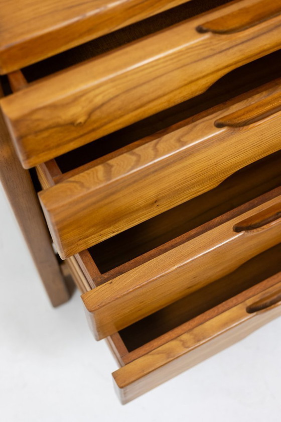 Image 1 of Maison Regain. Cassettiera in olmo. Circa 1970.