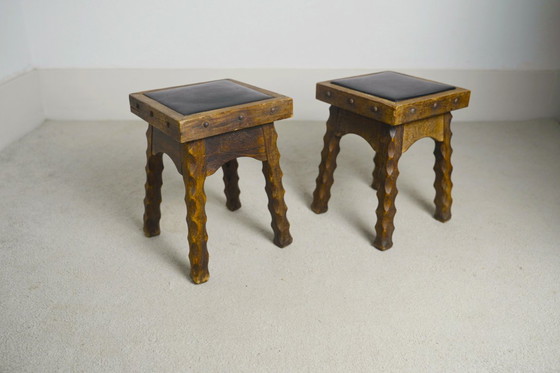Image 1 of Rustic Oak Stools, 1940s French Hand-Carved Farmhouse Milking Stools, Fireplace Chalet Mountain Decor with Studded Leather Seats