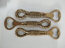 Apribottiglie in ottone dal design marittimo vintage