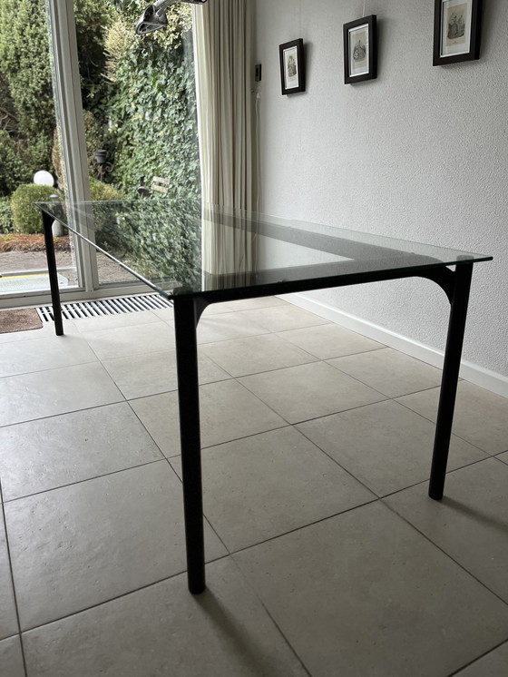 Image 1 of Mesa de comedor de cristal de diseño único con base de acero 218x87 cm
