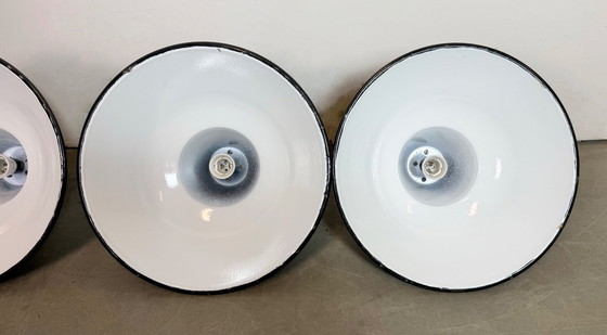 Image 1 of Set of 4 Industrial Black Enamel Factory Lamps with Cast Iron Top, 1950s