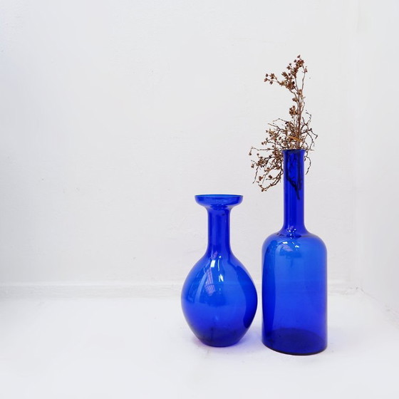 Image 1 of Pair of hand-blown cobalt blue glass vases or carafes, dating from the 1960s.