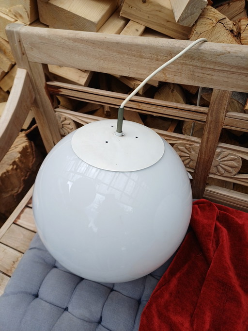 Three milky white glass lamps round