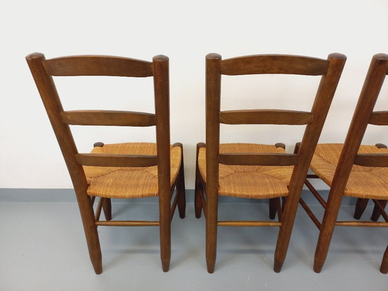 Image 1 of Set van 4 vintage brutalistische stoelen van hout en stro uit de jaren 60.