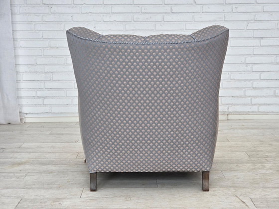 Image 1 of Deense fauteuil uit de jaren 50, meubelstof, gesneden eikenhout.