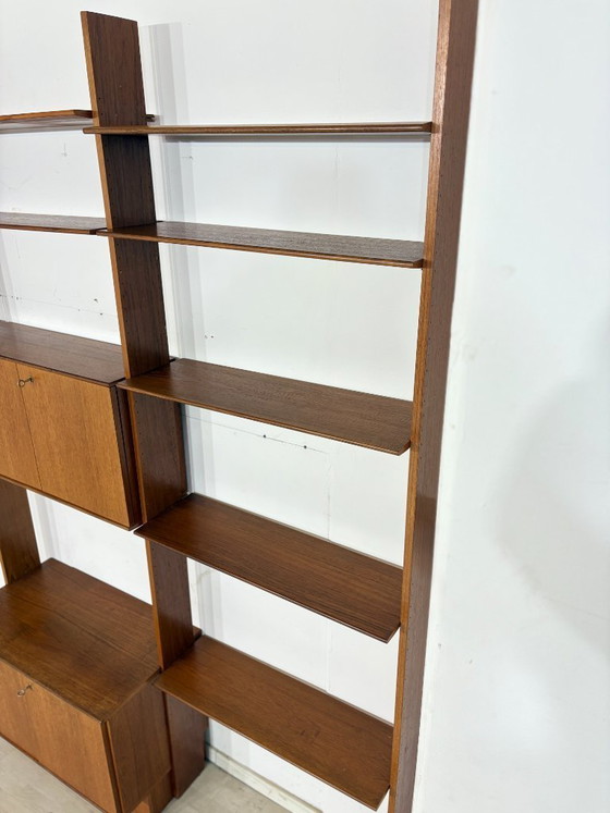Modular mid-century wall shelf by interna-Peter Pedrides / Teak shelving system 1960s – Shelving unit, Wood (photo 23 of 27)