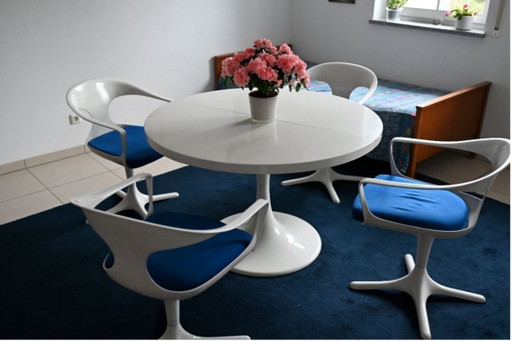 Tulip dining table with five dining chairs and sideboard - Lübke company