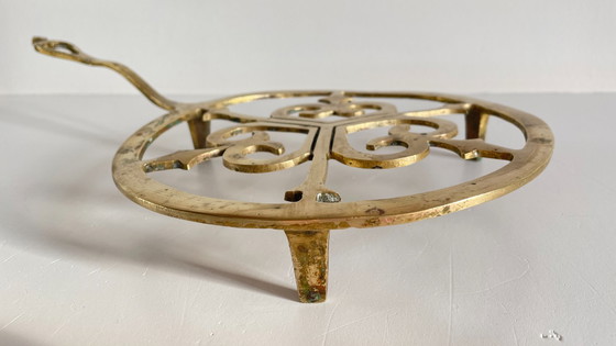 Image 1 of Solid brass trivet