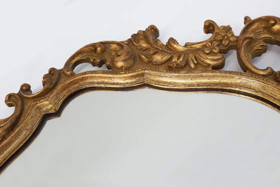 Image 1 of Baroque style oval wall mirror in gilded wood, France