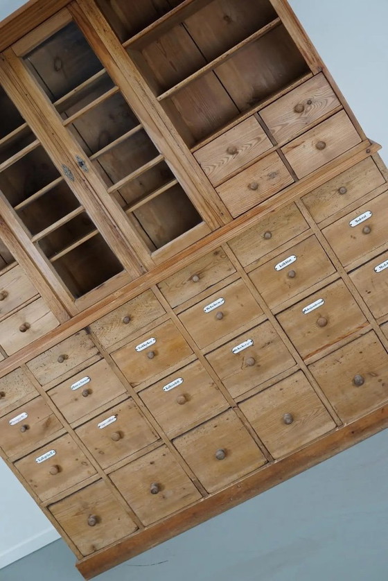 Image 1 of Large antique German apothecary cabinet / display cabinet in pine, early 20th century